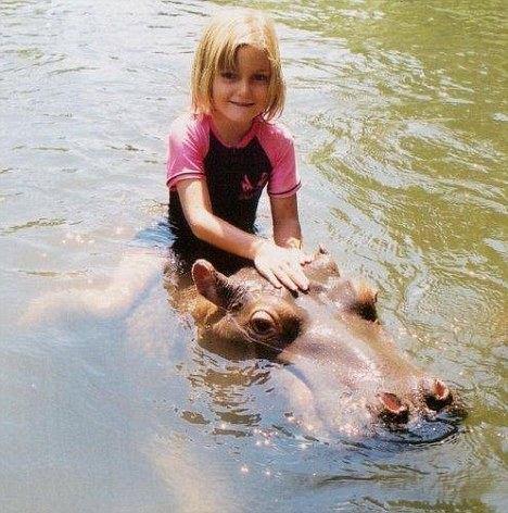 Girlgettingrideonhippo